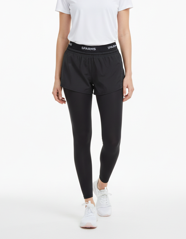 Woman wearing a white t-shirt and black leggings with a brand logo on a white background