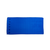 SPARMS | Blue Microfibre towel . A blue rectangular towel with the brand name 'SPARMS' printed vertically in a matching dark tone on the left edge, shown against a plain white background.