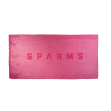 SPARMS | A rectangular pink towel or mat with a distressed, textured surface, featuring the word 'SPARMS' printed in black capital letters across the center, set against a plain white background. Microfibre towel.
